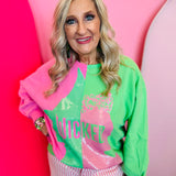 Queen of Sparkles Wicked Sweatshirt, green and pink colorblock with glittery character profile graphic.