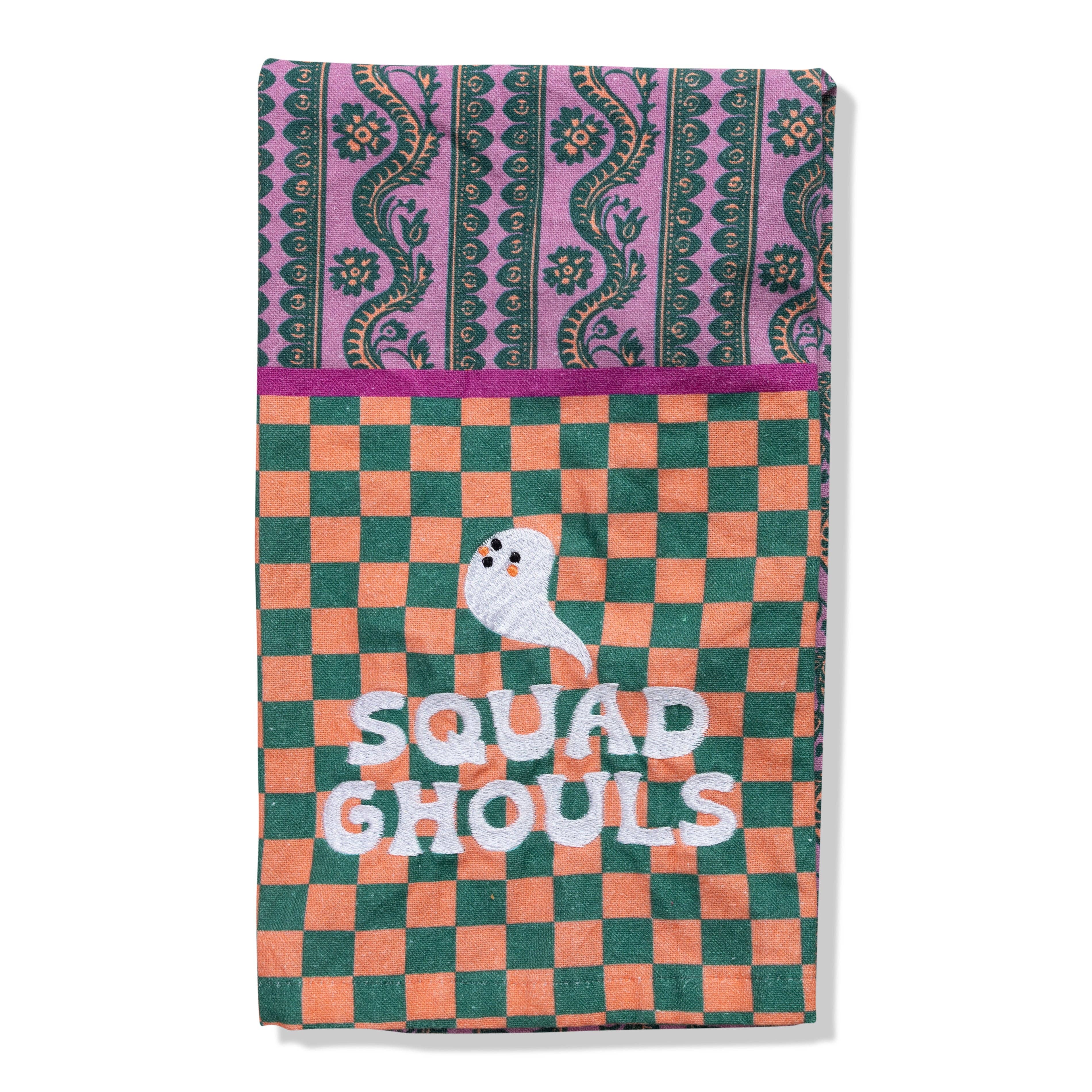 Squad Ghouls Halloween tea towel with spooky crew design for festive kitchen décor.