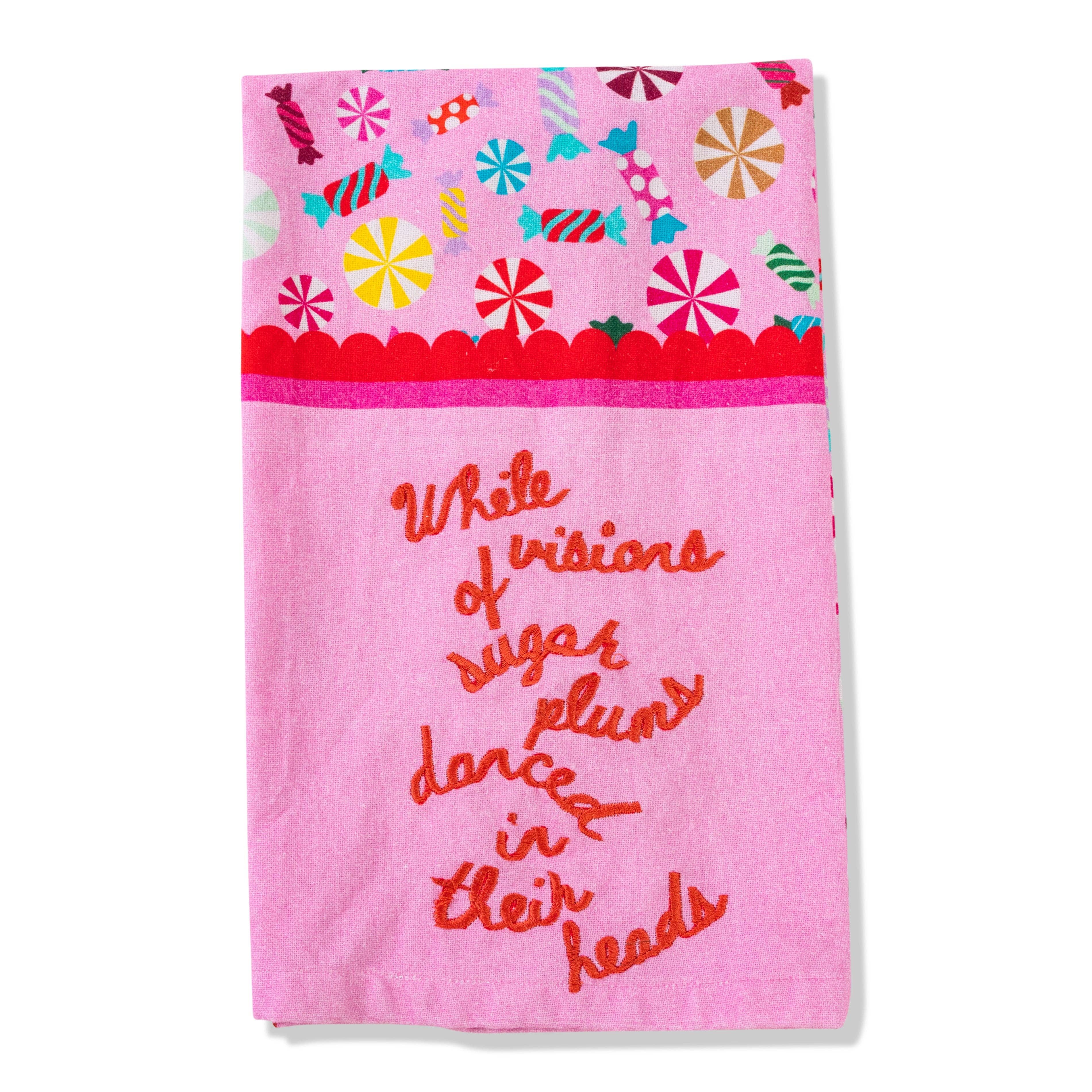 Pink Sugar Plums dish towel with candy-print trim in red, green, and gold. 100% cotton.