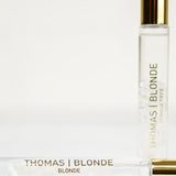 Thomas Blonde - 10mL roll-on perfume bottle with a clear cap, showing moonstone crystals inside.