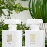 Thomas Blonde - white and gold 1.7 oz perfume bottle.