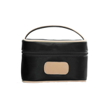 A black colored Jon Hart mini makeup case with natural leather trim and a leather patch for personalization.