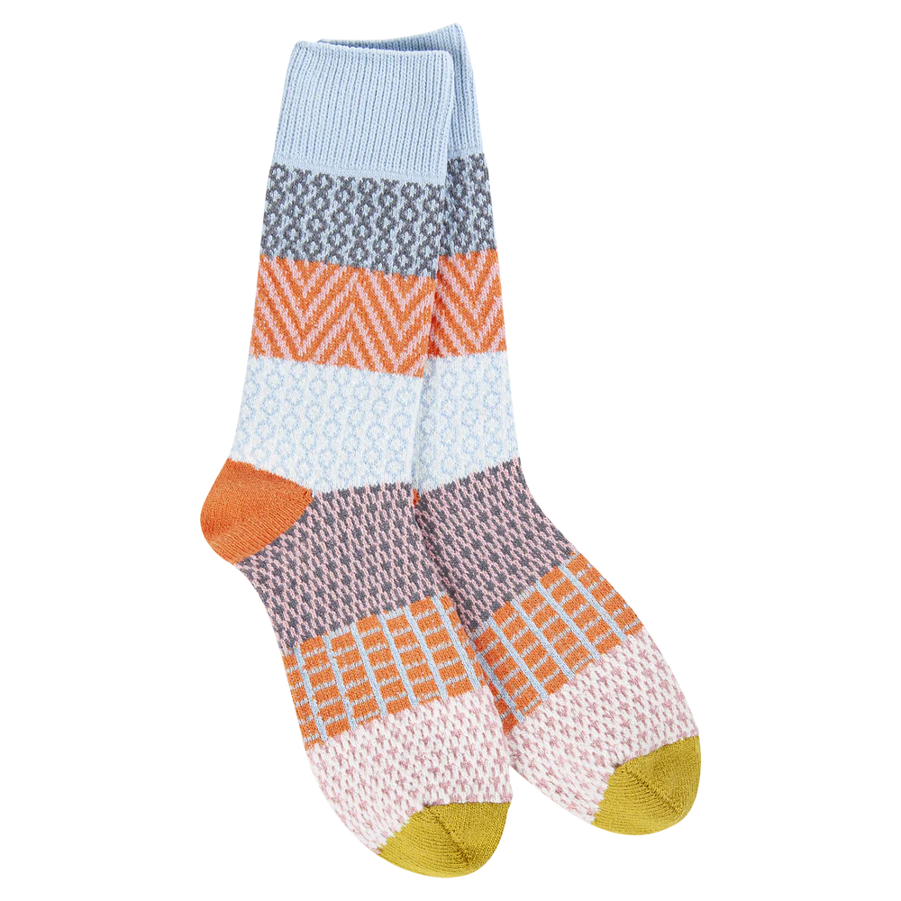 World’s Softest Socks color blocked crew socks in shades of blue, orange, gray, and pink and gold toe and orange heel.