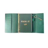 Inside view of green clutch folio journal with calender and matching pen. 'FUCK IT UP' gold foil text.