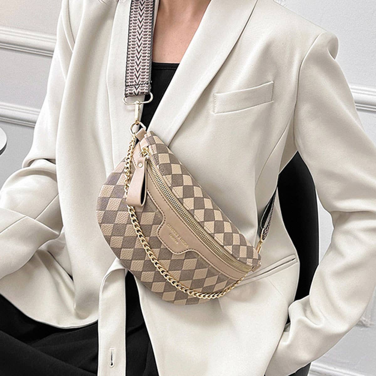 View of model wearing the beige checkered crossbody bag.