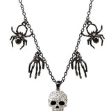 Halloween multi-charm necklace with spiders, skull hands, and a silver skull pendant.
