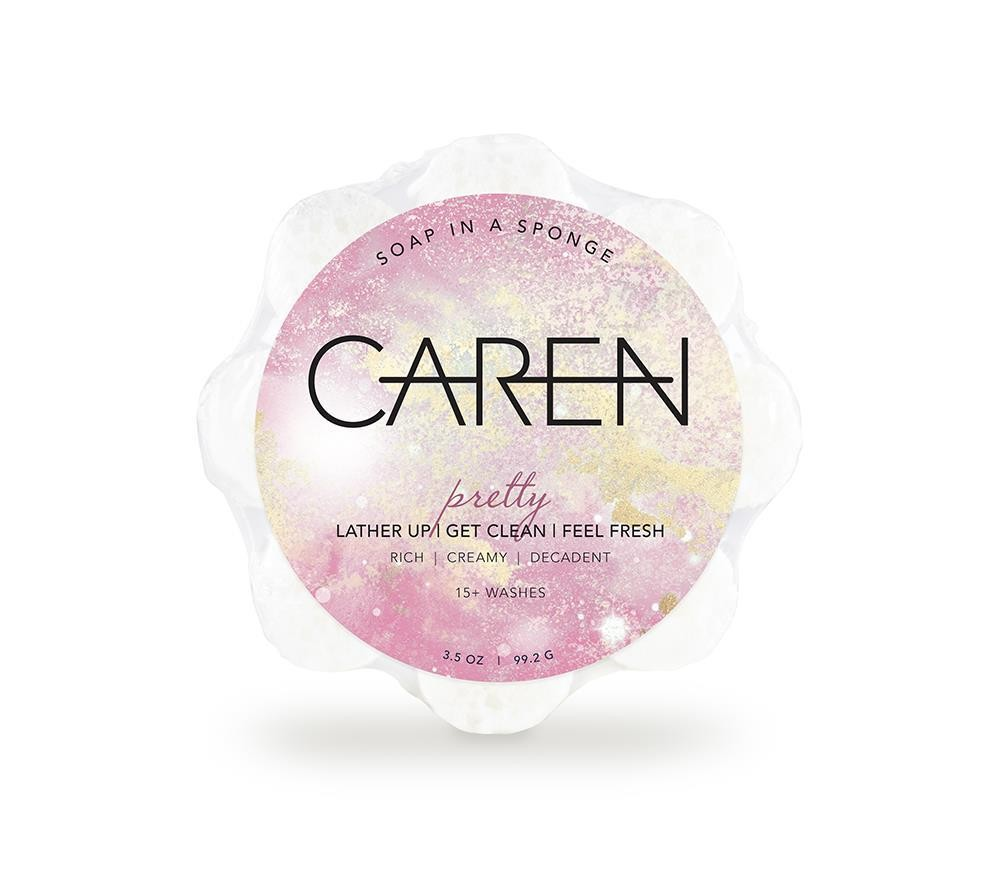 A pink, soap-infused sponge with the word "Pretty" printed on the front.