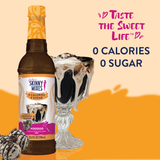Bottle of Skinny Mixes SF Voodoo Syrup with zero-calorie cookies and cream flavor, ideal for coffee, smoothies, and desserts.