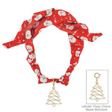Silk knotted scarf necklace with Santa print and gold Christmas tree removable charm.