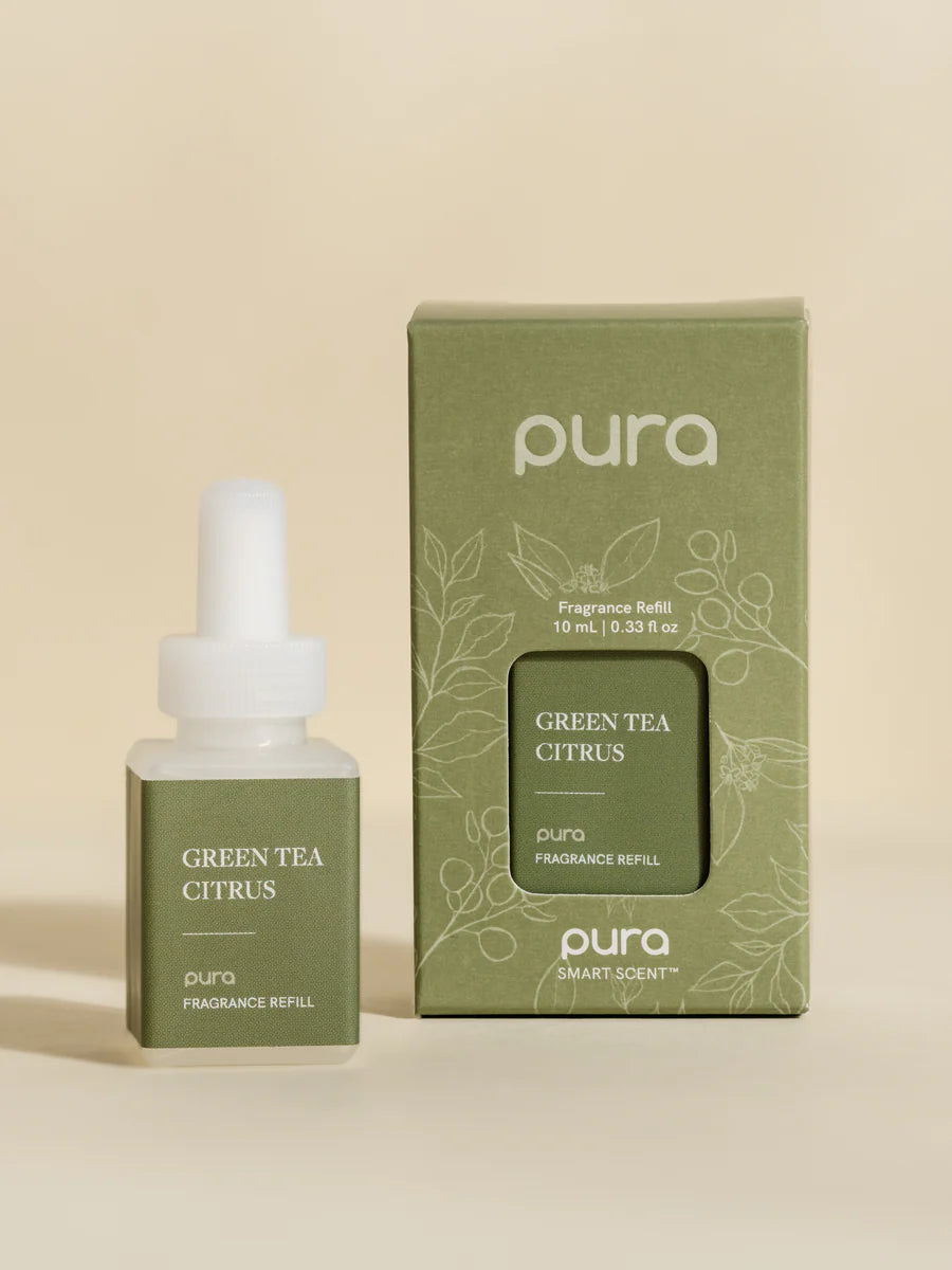 Pura Green Tea Citrus fragrance refill bottle.