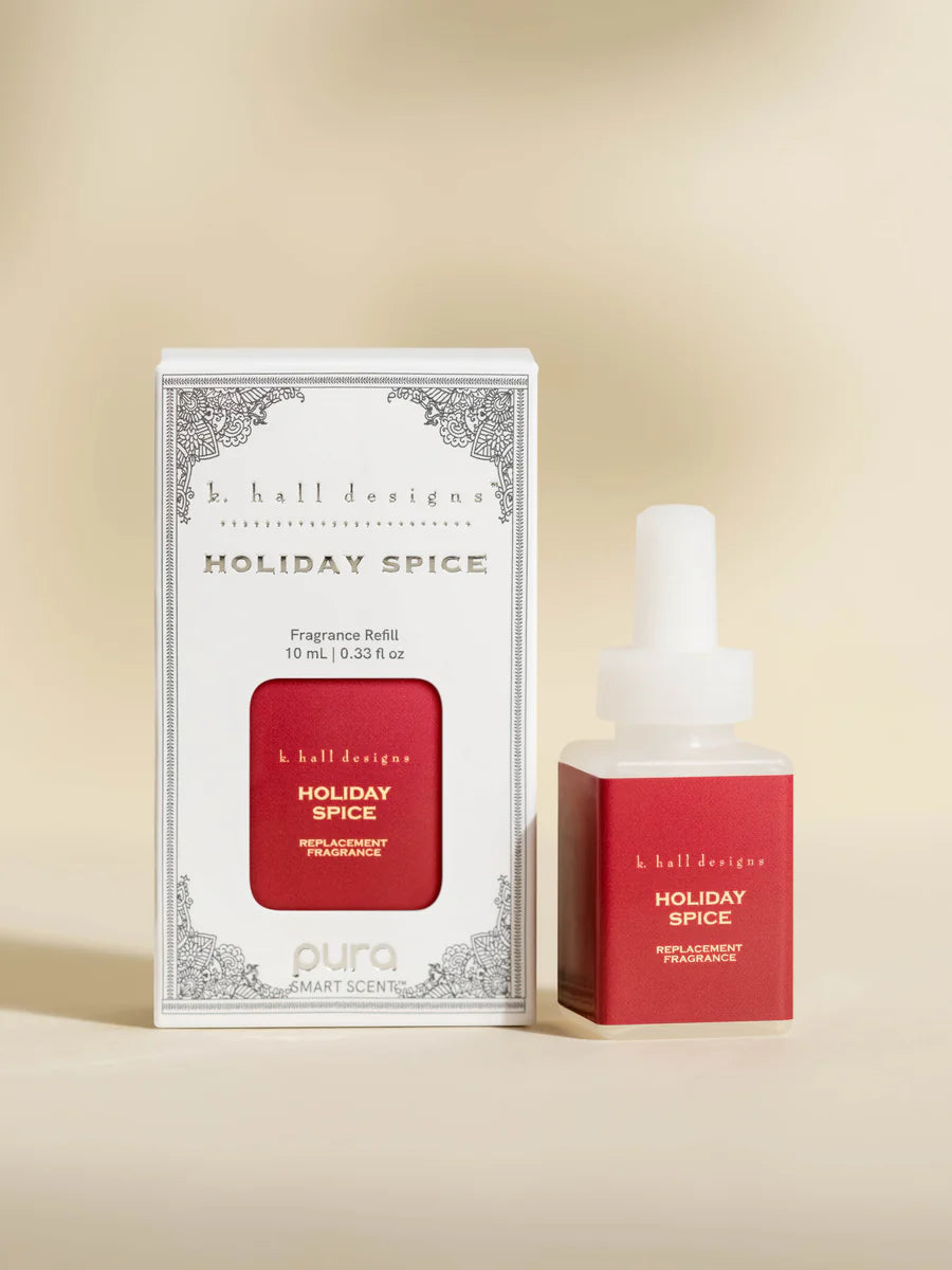 Pura Holiday Spice fragrance refill bottle.