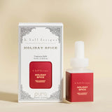 Pura Holiday Spice fragrance refill bottle.