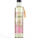 A sophisticated, clear glass bottle of "Pretty" bubble bath.