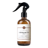 A bottle of Rowe Casa Immunity Spray with a spray dispenser