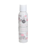 A bottle of Sweet Grace Wrinkle Release Spray with a floral design on the label.