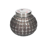 Sweet Grace candle in round graphite colored dot imprinted container.