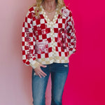 Video of Queen of Sparkles checkered sequin and rhinestone game day cardigan.