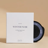 Pura Winter Noir car fragrance refill bottle.