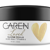A jar of "Loved" sugar scrub.