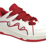 Red and white sneakers with a dynamic wave design, thick platform sole, and zigzag laces — bold, sporty, and eye-catching.