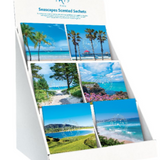 A square, 4.3-inch Inis scented sachet with beautiful beach scenery printed on the packaging.