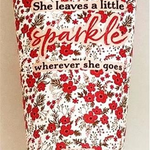 2 oz sustainable sugarcane tube of "She Leaves a Little Sparkle" hand treatment.