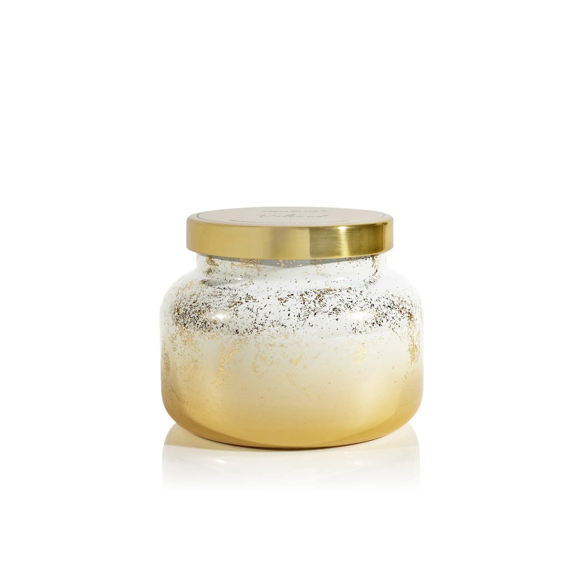 Capri Blue - 19oz Volcano Glimmer Signature Candle with an ombre design and metallic accents.