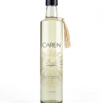 A bottle of "Dazzle" bubble bath.