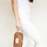 Jon Hart Wristlet with coated canvas, leather trim, zippered closure, and detachable strap for stylish organization.