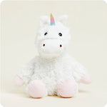 A soft, white plush unicorn toy with a rainbow mane and tail and a sparkly horn, designed to be microwavable.