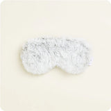 A soft, plush gray eye mask with a satin elastic strap, designed to be microwavable.