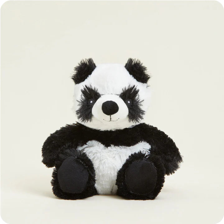 A small, soft plush panda toy with characteristic black and white patches and friendly eyes, designed to be microwavable.
