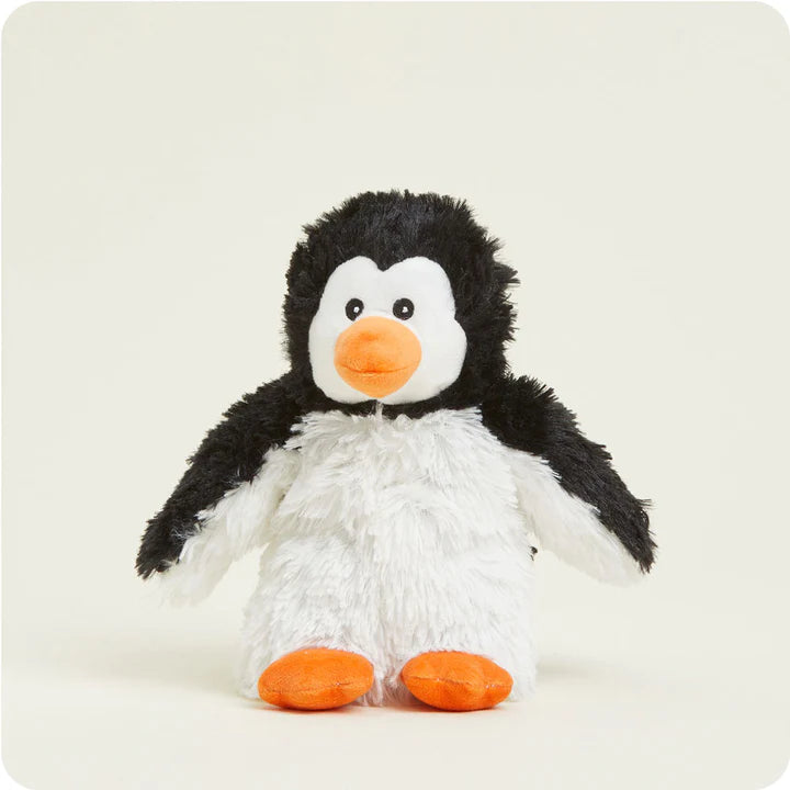 A small, soft plush penguin toy with black, white, and orange features, designed to be microwavable.