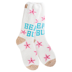 A pair of plush, soft crew socks with turquoise lettering that reads "Beach Bum" and is accented with pink stars. The socks have solid tan heels and toes.