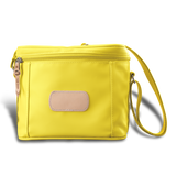 Versatile insulated Jon Hart lunch box with removable insert, zip closure, and adjustable shoulder strap in coated canvas with natural leather trim.