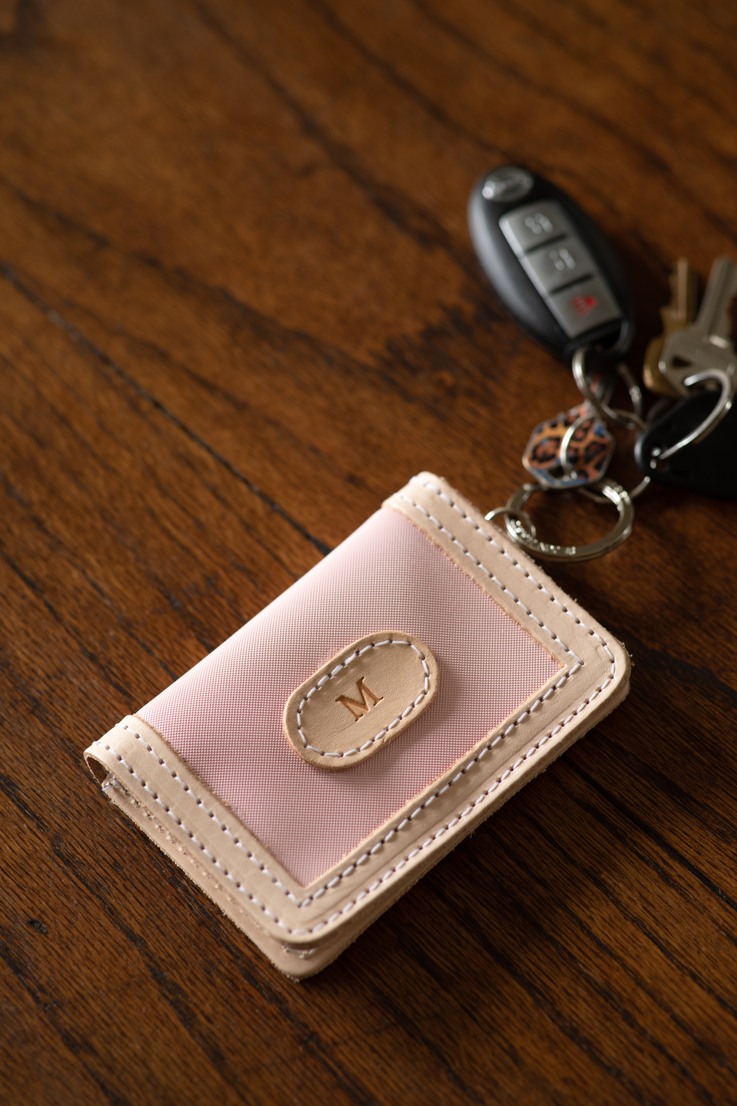 Jon Hart Wallet on a Ring with customizable leather patch, clear ID slot, and attached key ring.