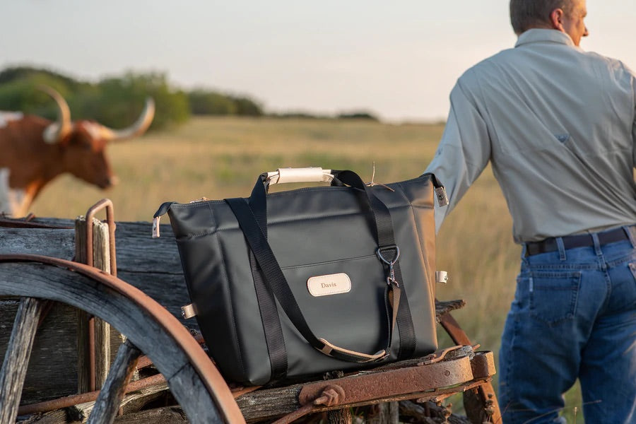 Jon Hart Large Cooler with leather trim, foam insulation, and adjustable snaps for spacious cold storage.