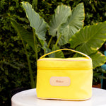 Jon Hart Makeup Case with coated canvas, leather trim, zippered closure, and interior pocket for organized travel.