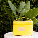Jon Hart Makeup Case with coated canvas, leather trim, zippered closure, and interior pocket for organized travel.