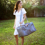 Jon Hart Medium Square Duffel with coated canvas, leather trim, and trolley sleeve for organized carry-on travel.