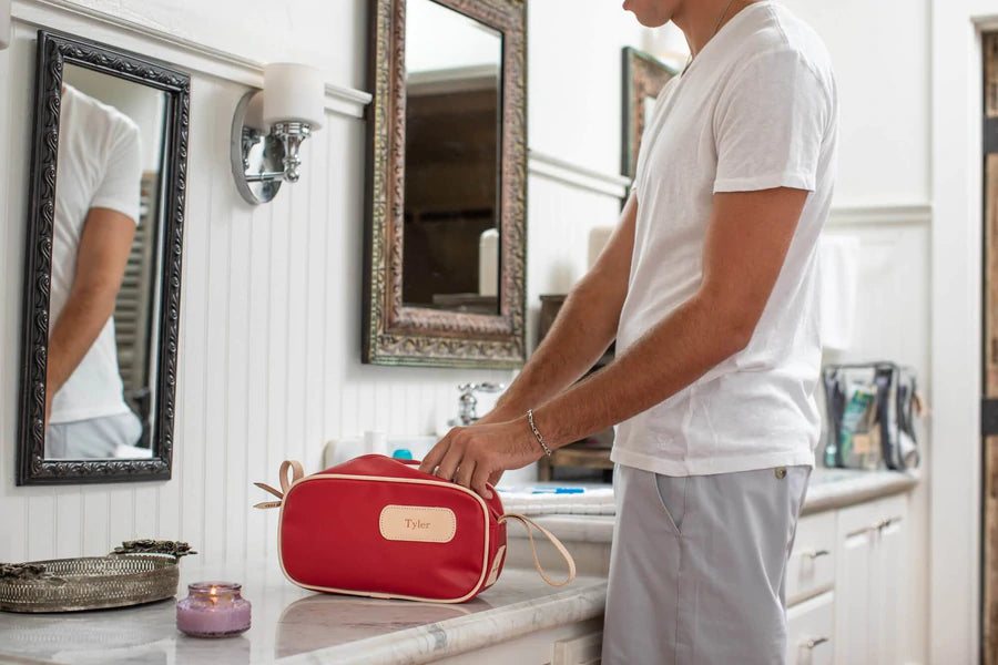 Jon Hart Shave Kit with coated canvas, natural leather trim, and zippered closure for organized travel essentials.