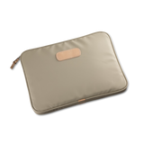 Jon Hart 15-inch padded computer case in coated canvas with natural leather trim, soft protective interior, and full zip closure — designed for laptops up to 15 inches wide.