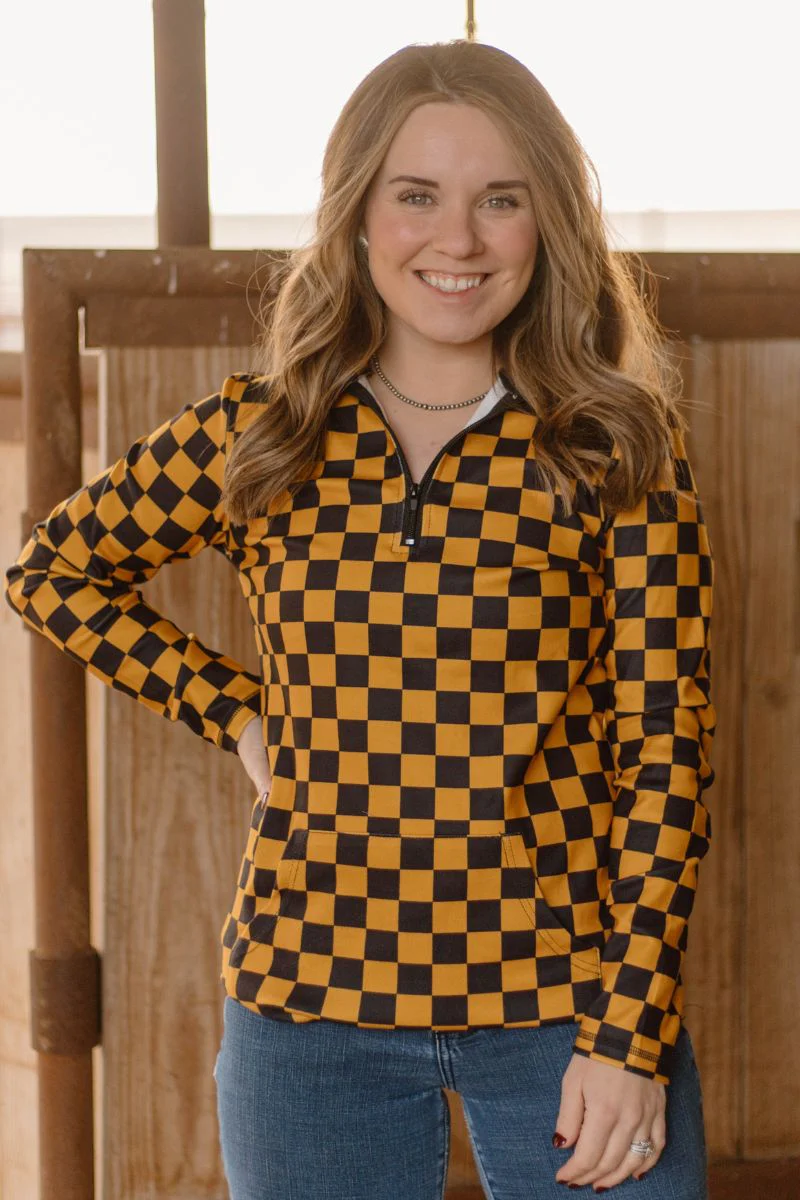 Gold and black checkered pullover with collared neckline, quarter-zip front, and kangaroo pocket, laid flat to highlight bold colors and design.