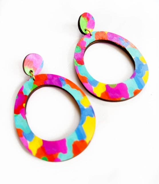 Colorful oval earrings on a white background