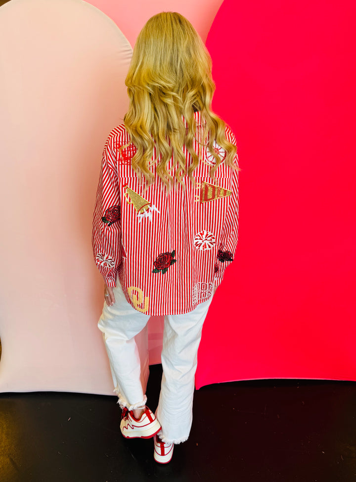 Back side of Queen Of Sparkles crimson red and white stripe icon University Of Oklahoma game day blouse.