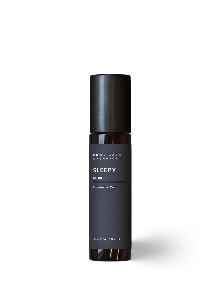 Sleep wellness essential oil blend with lavender, cedarwood, and Roman chamomile.