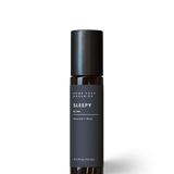 Sleep wellness essential oil blend with lavender, cedarwood, and Roman chamomile.