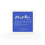 A soap-infused sponge with the word "Mom" on top. 