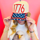 Cream 1776 patriotic hat with navy star bill and “It Was All A Dream” embroidery.