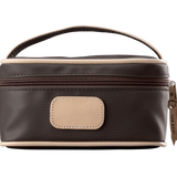 An espresso colored Jon Hart mini makeup case with natural leather trim and a leather patch for personalization.